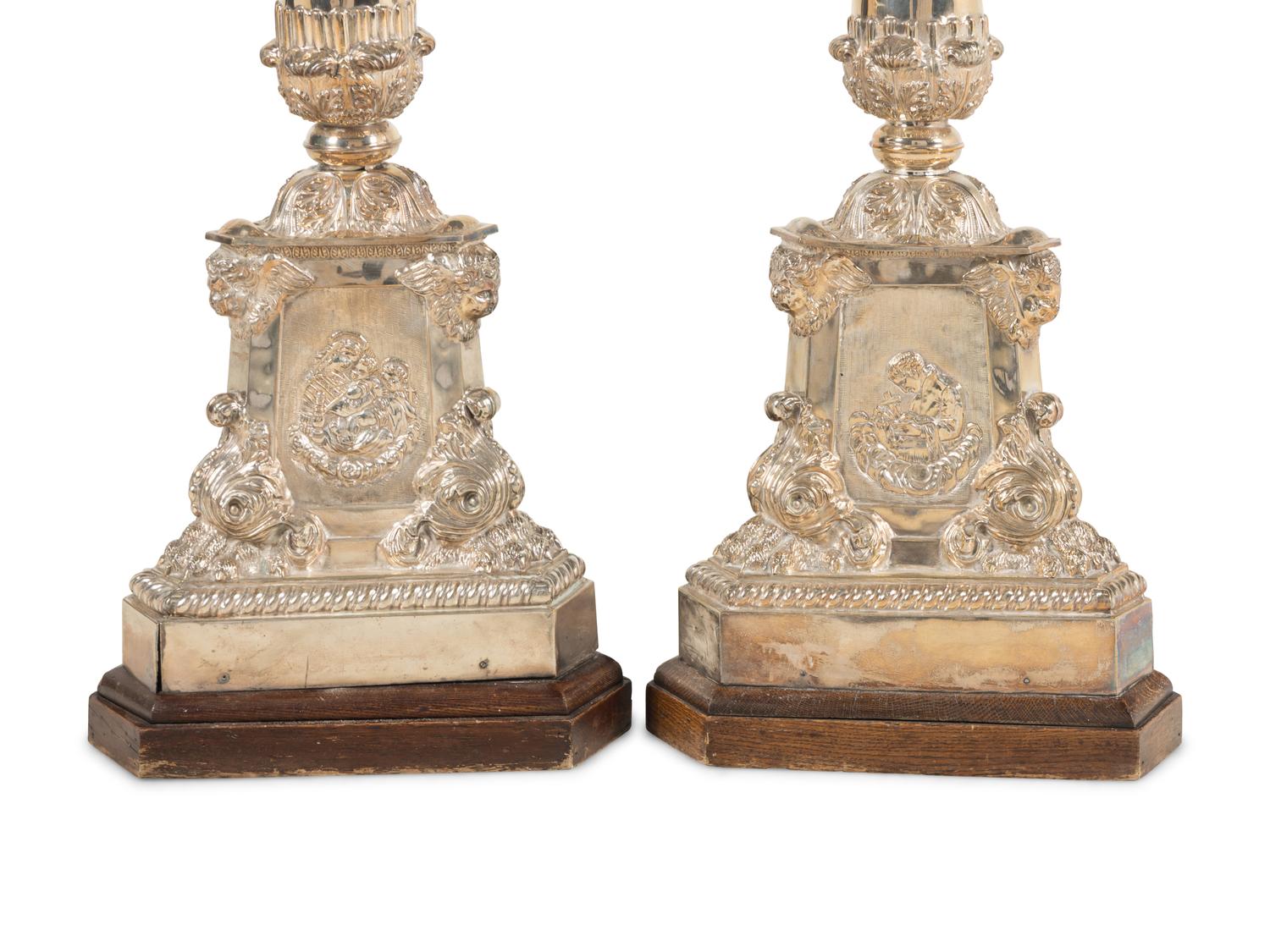 A Pair of Monumental Silvered Metal Altar Sticks