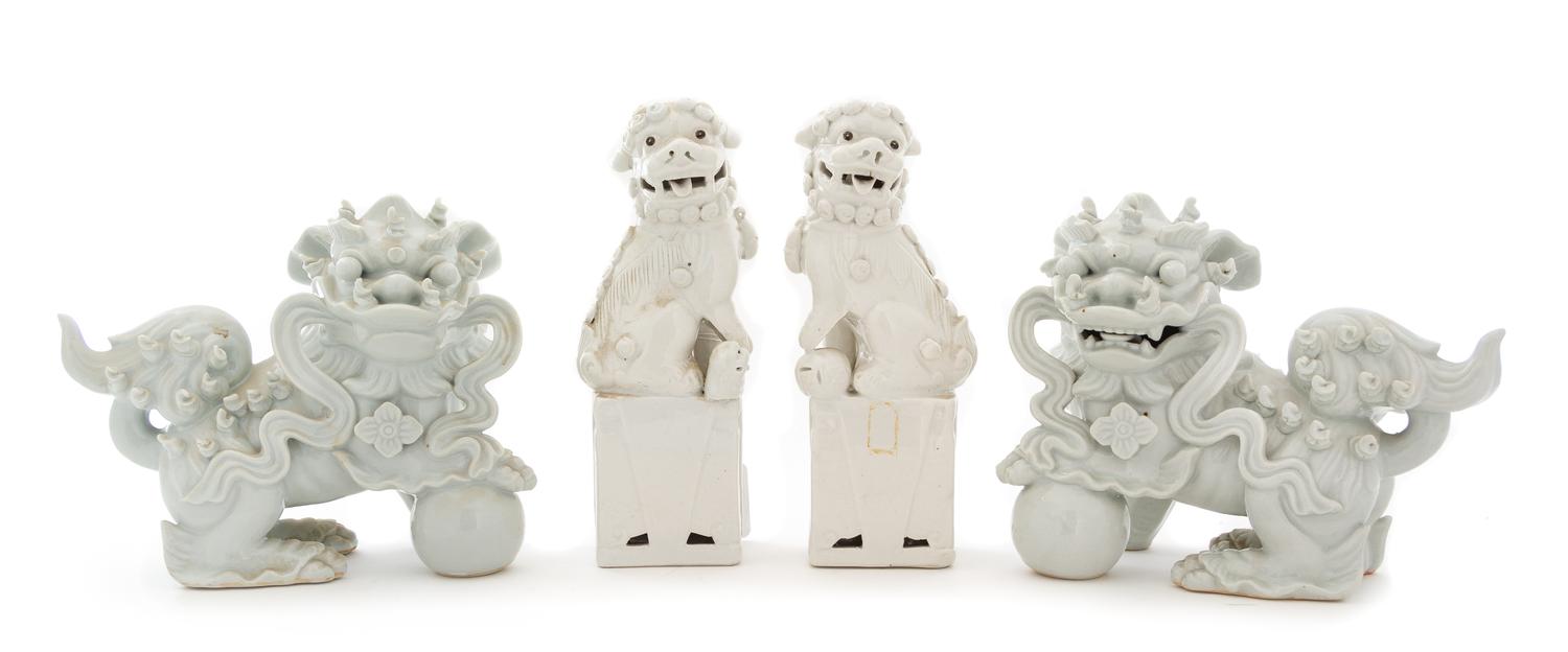 Two Pairs of Blanc-de-Chine Porcelain Figures of Fu Lions Height 8 1/4 inches. — 19TH CENTURY