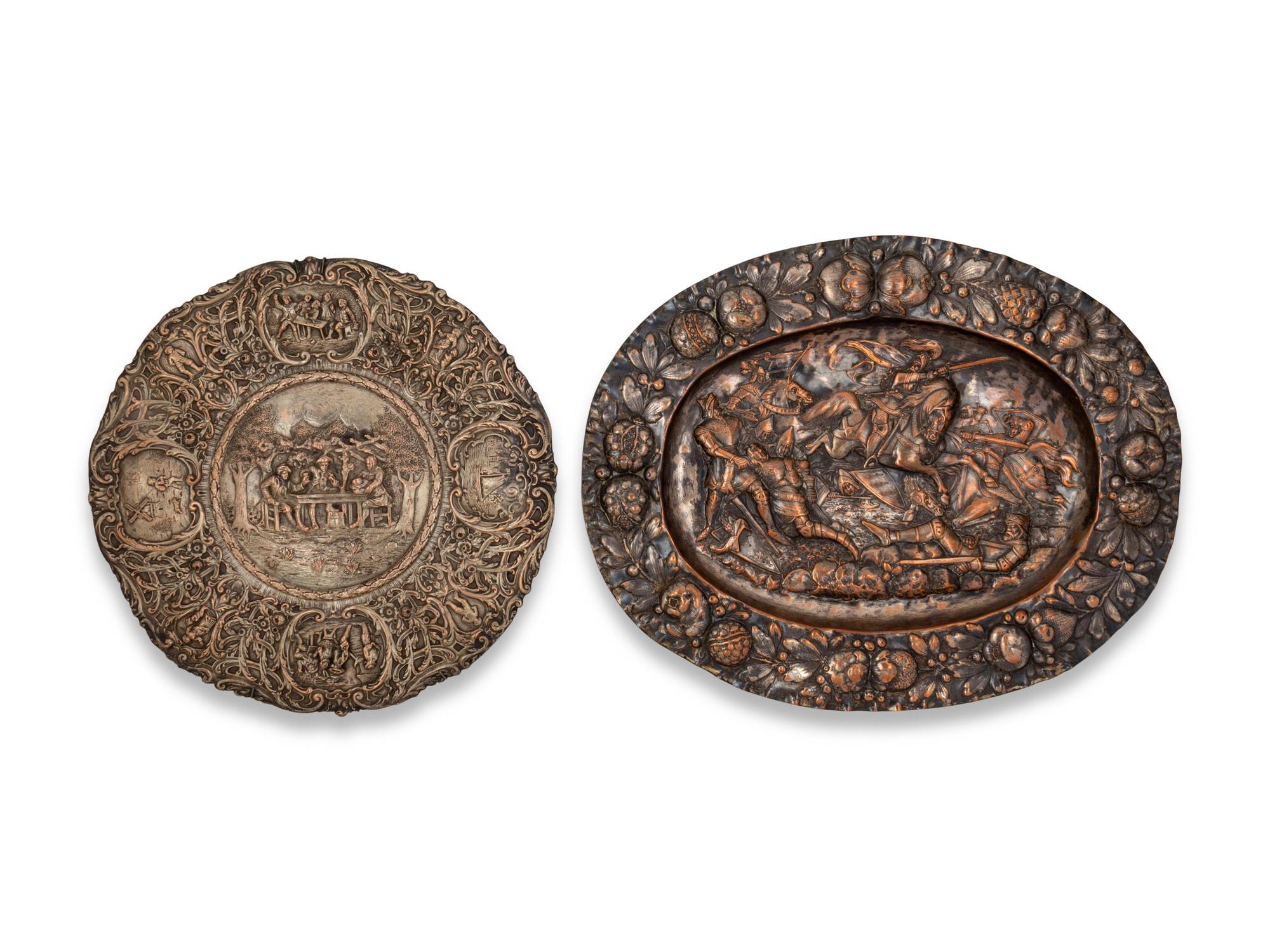 Two Silvered Metal Repousse Plaques