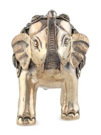 An East Indian Silver Plated and Jeweled Figure of an Elephant