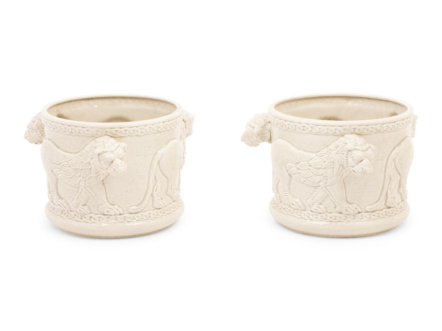 A Pair of Fitz and Floyd Glazed Ceramic Jardinières Modeled with Lions
