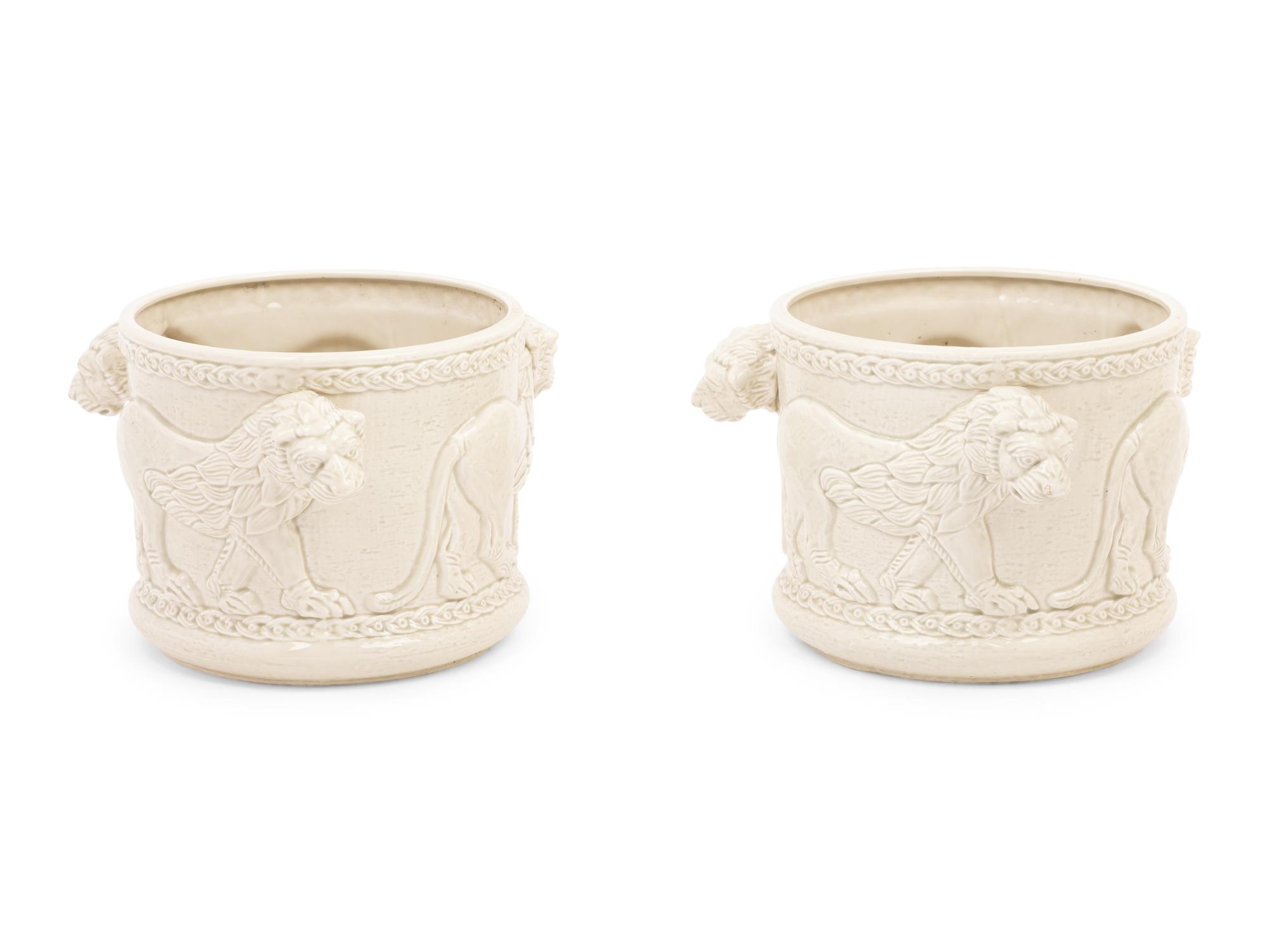 A Pair of Fitz and Floyd Glazed Ceramic Jardinières Modeled with Lions