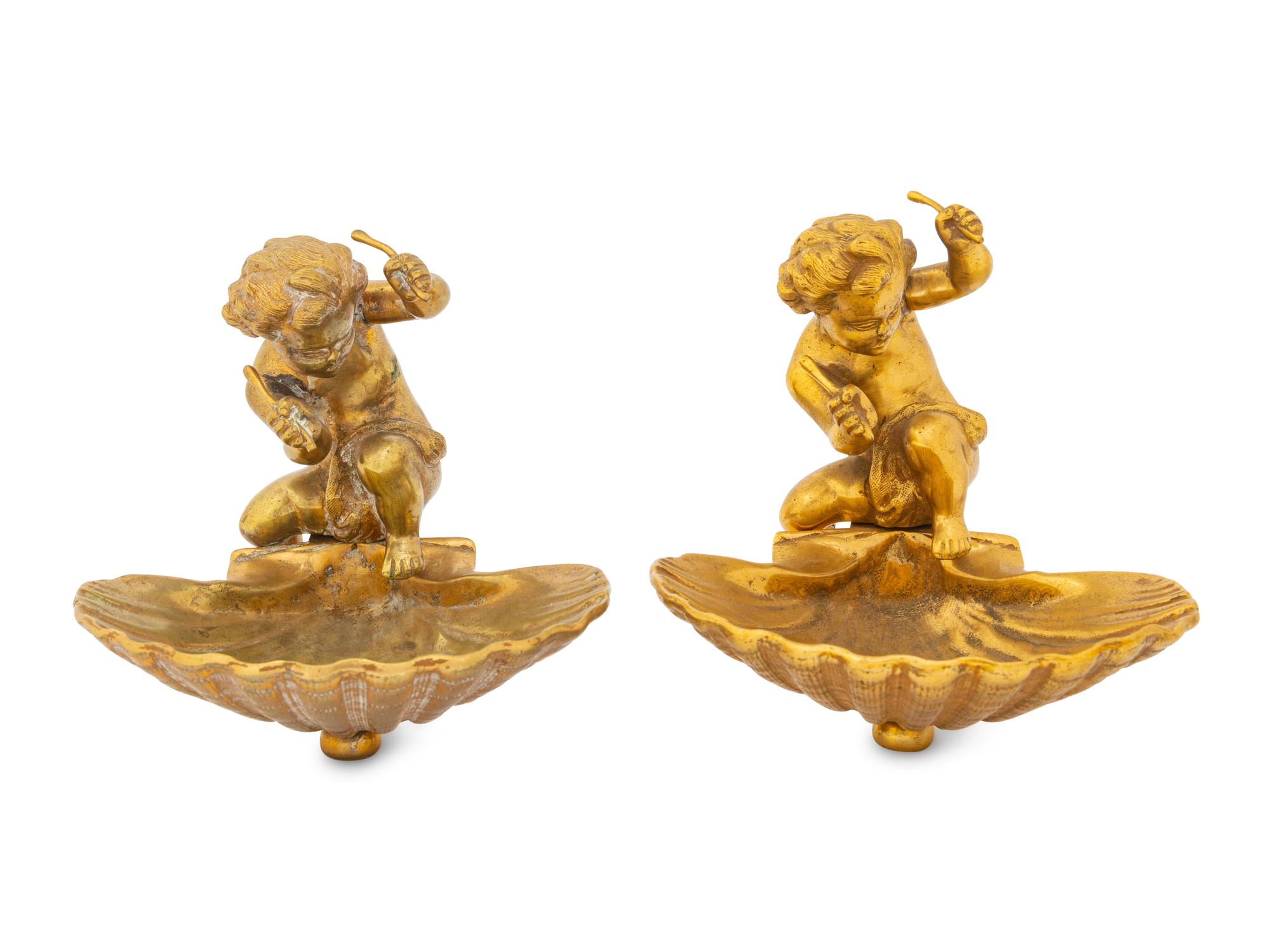 A Pair of Continental Gilt Bronze Putto and Shell Ornaments