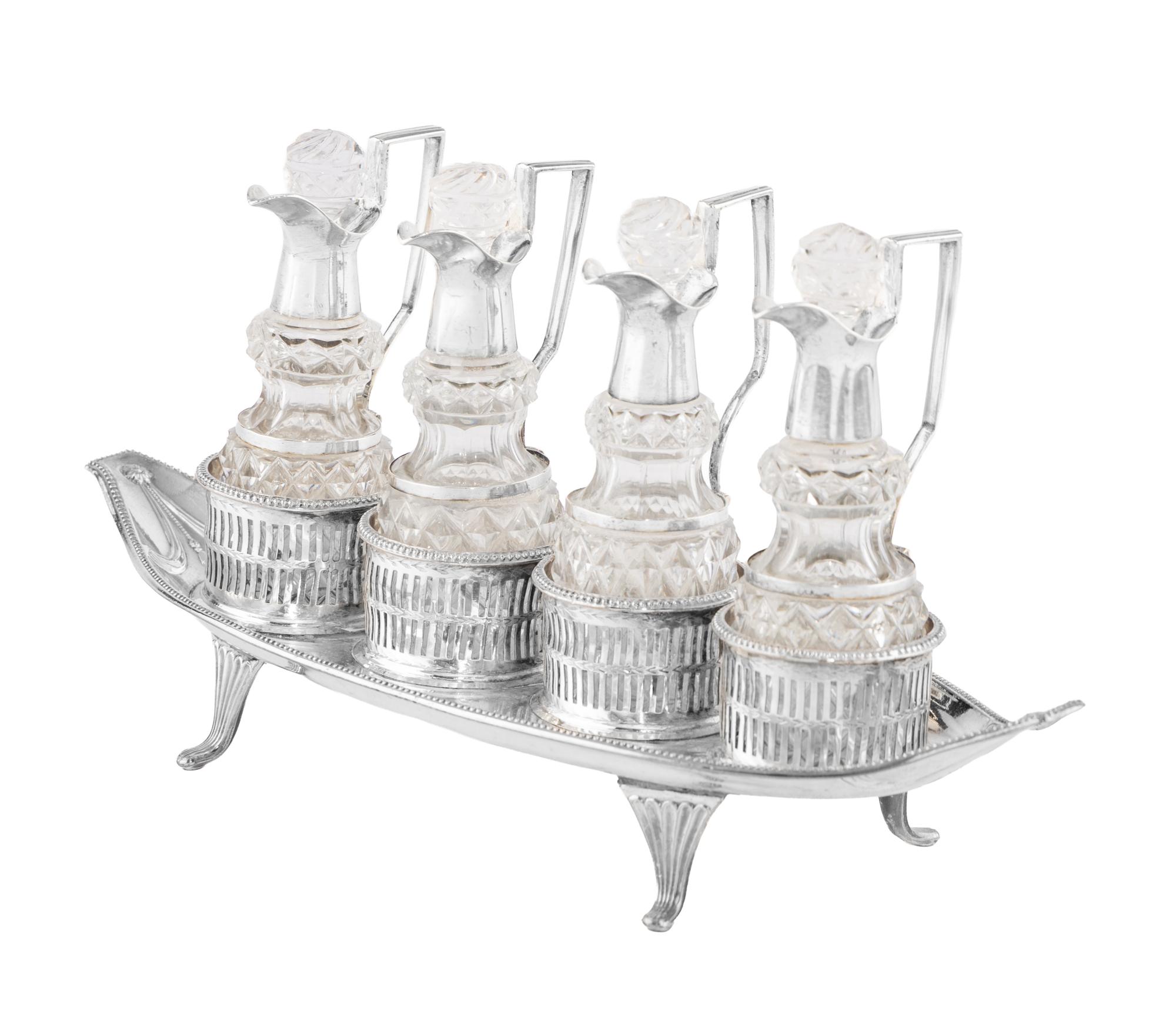 A George III Silver and Silver-Plate Cruet Set