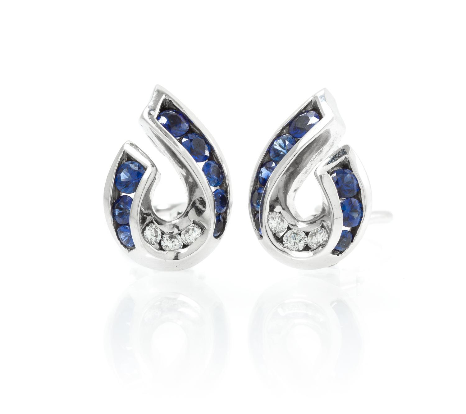 A Pair of 18 Karat White Gold, Sapphire and Diamond Earclips, Charles Krypell, 7.30 dwts.