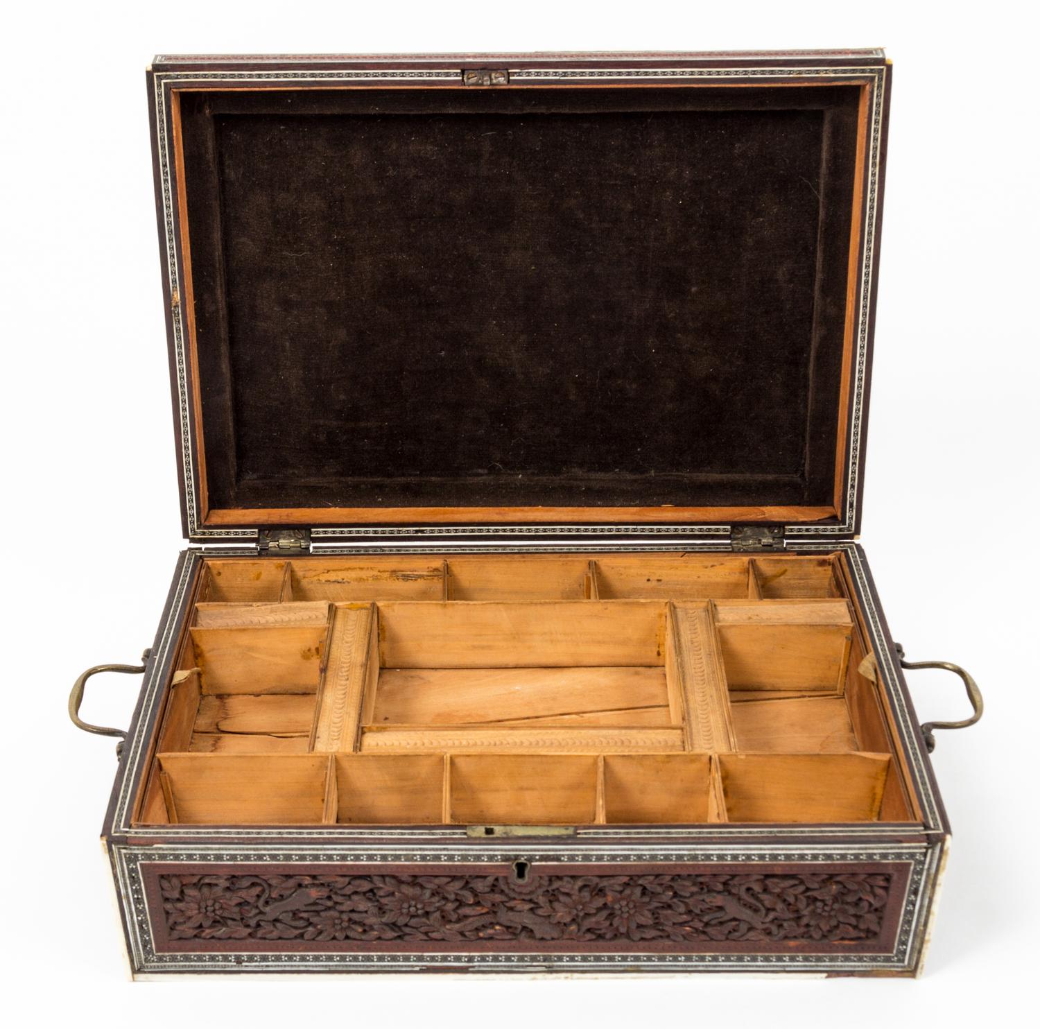 A Carved Wood Sewing Box Height 4 1/2 x width 12 7/8 x depth 9 1/4 inches.