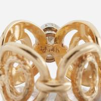 A diamond and gold ring