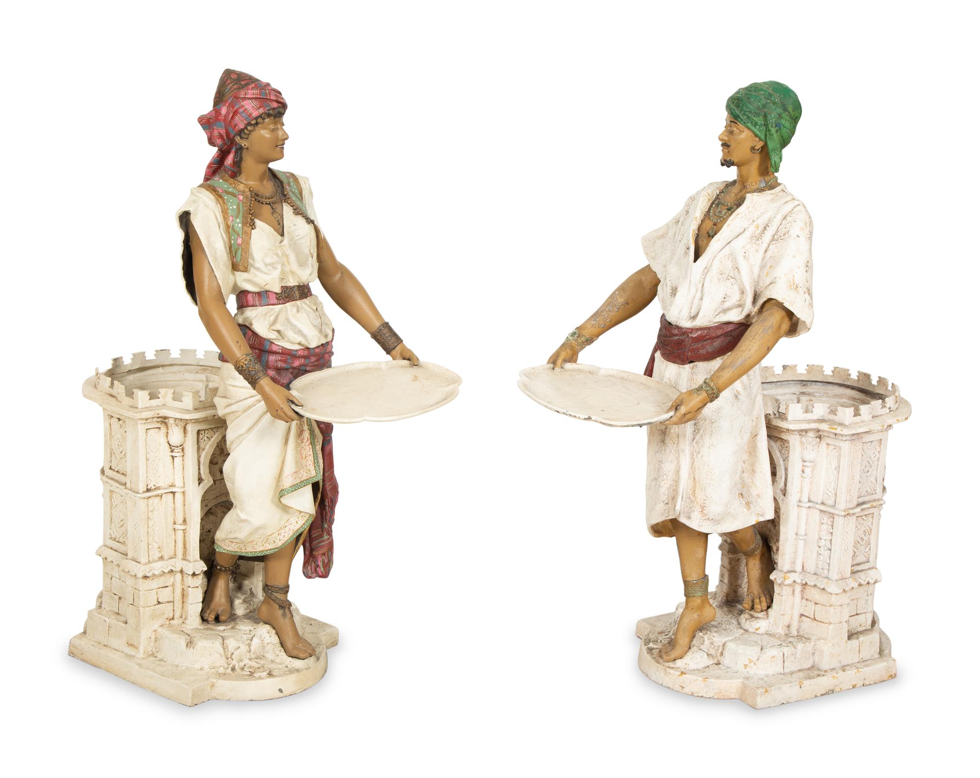 Pair of Orientalist Figures Holding Trays