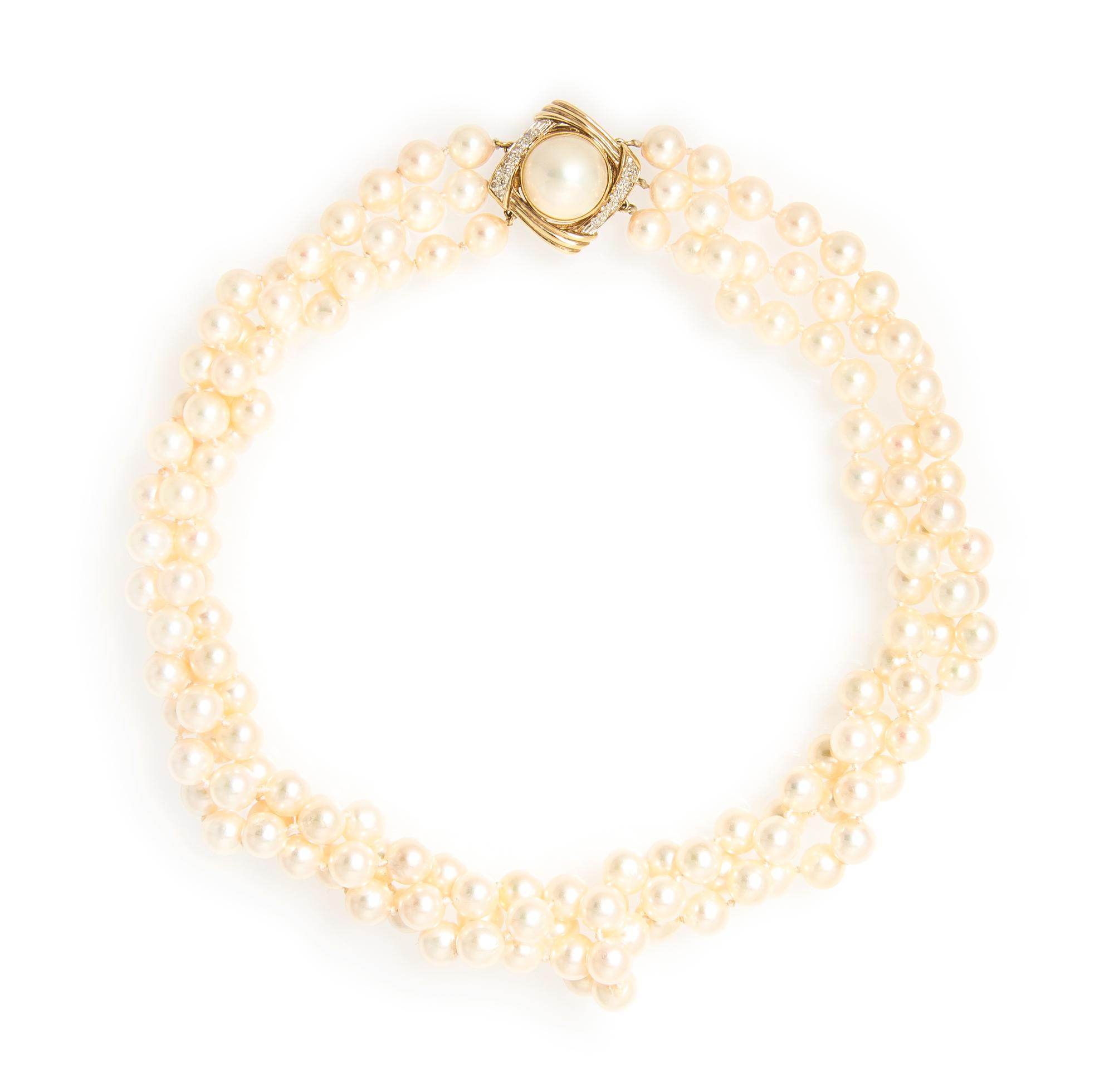 A 14 Karat Yellow Gold, Diamond, Mabe Pearl and Cultured Pearl Triple Strand Necklace, 46.50 dwts.