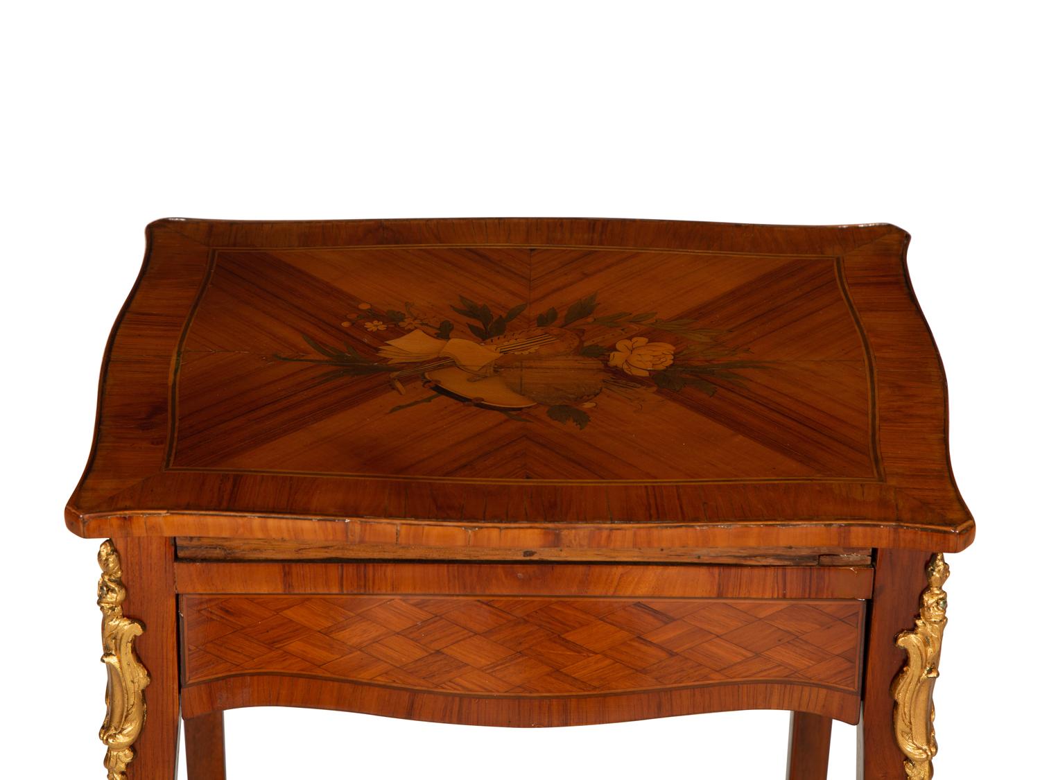A Louis XV/XVI Transitional Gilt Bronze Mounted Marquetry Library Table
