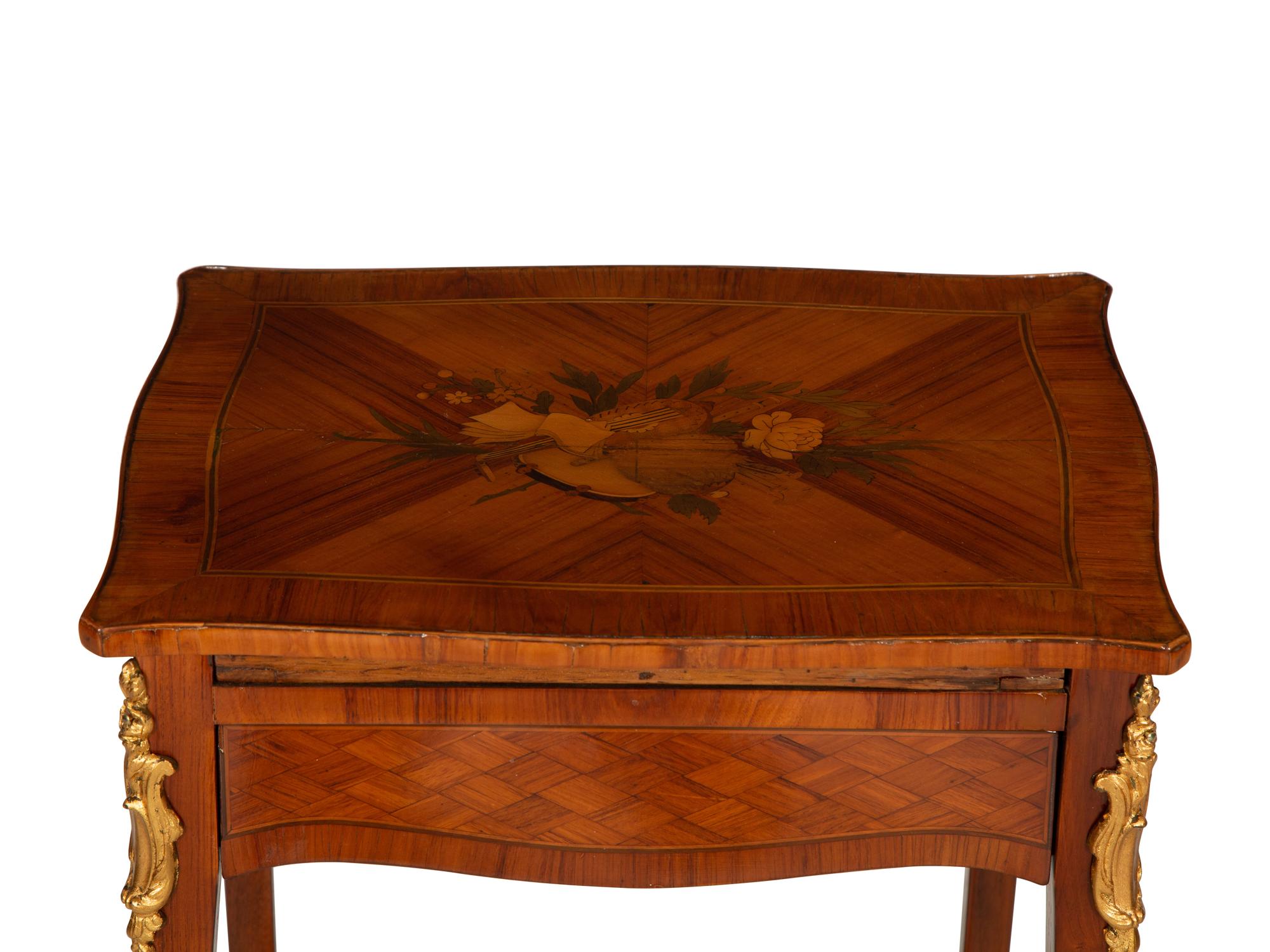 A Louis XV/XVI Transitional Gilt Bronze Mounted Marquetry Library Table