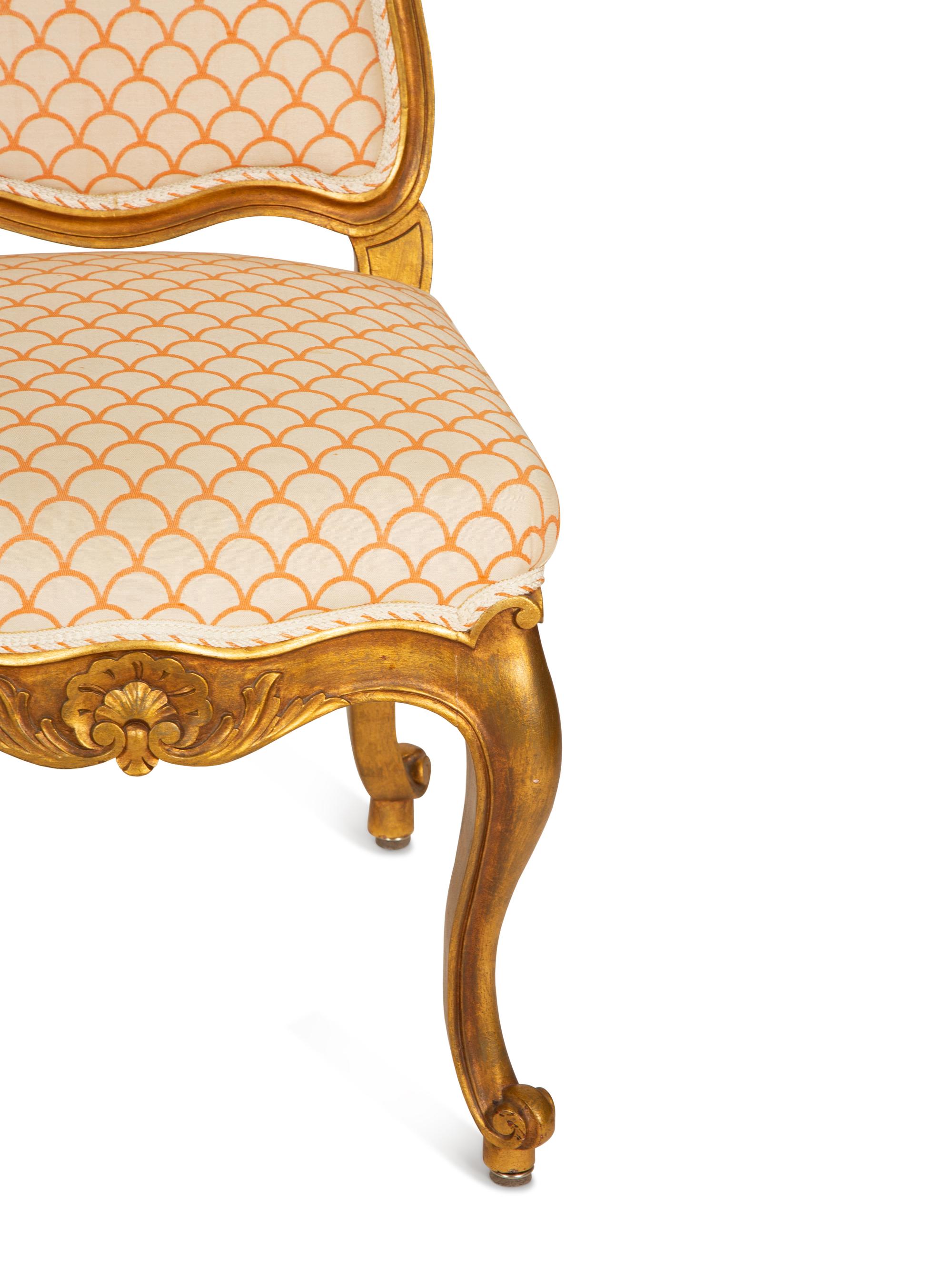A Pair of Louis XV Style Carved Giltwood Side Chairs