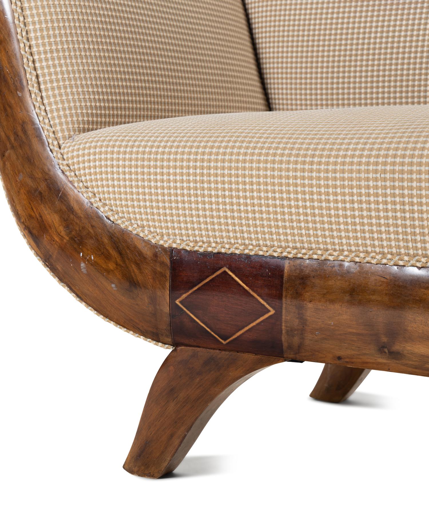 A Biedermeier Figured Walnut Sofa