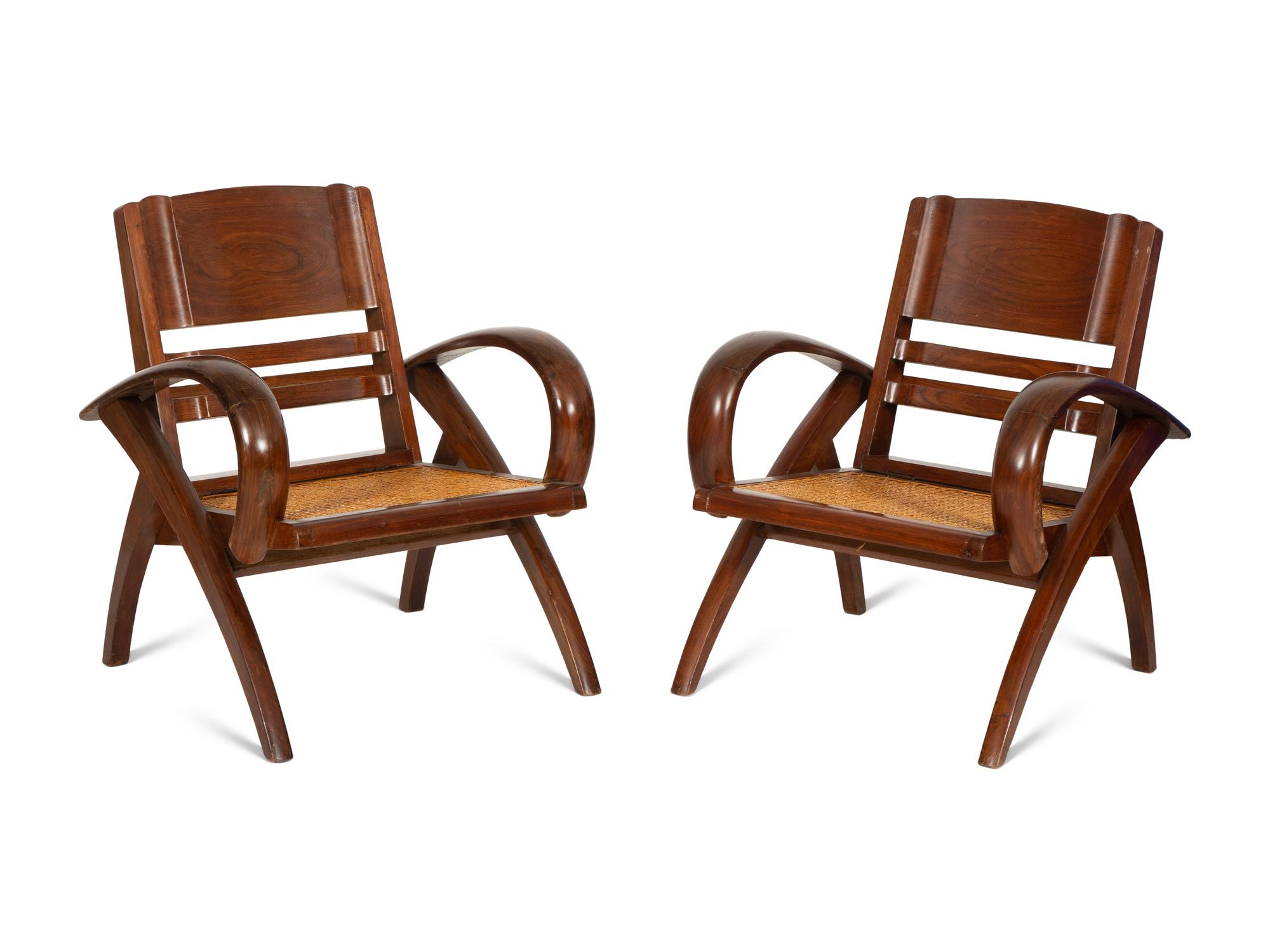 A Pair of Art Deco Walnut and Caned Folding Lounge Chairs