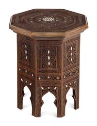 A Moorish Style Mother-of-Pearl Inlaid Carved Walnut Table