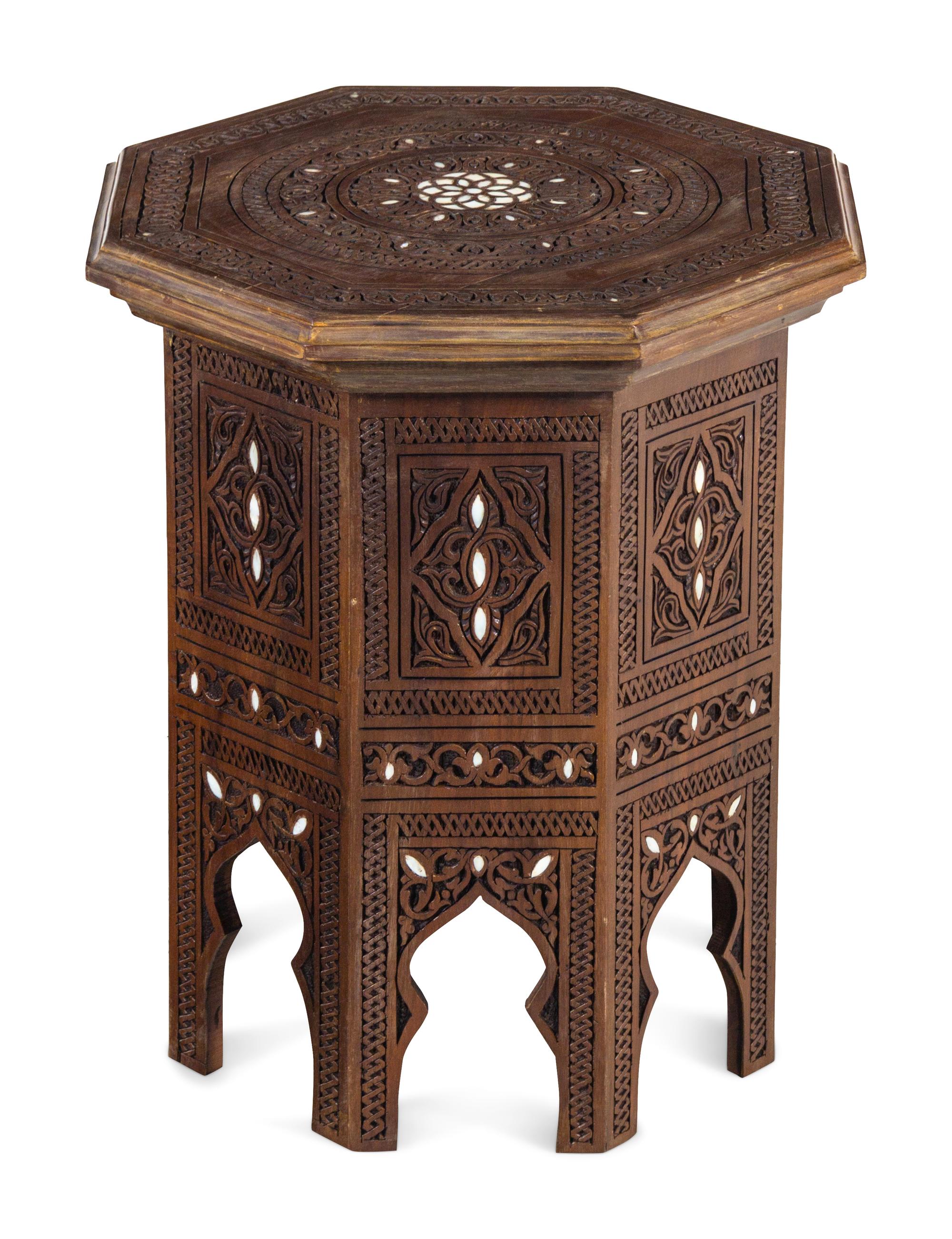 A Moorish Style Mother-of-Pearl Inlaid Carved Walnut Table