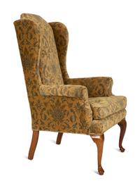 A Queen Anne Style Upholstered Wing Back Armchair — 20th Century