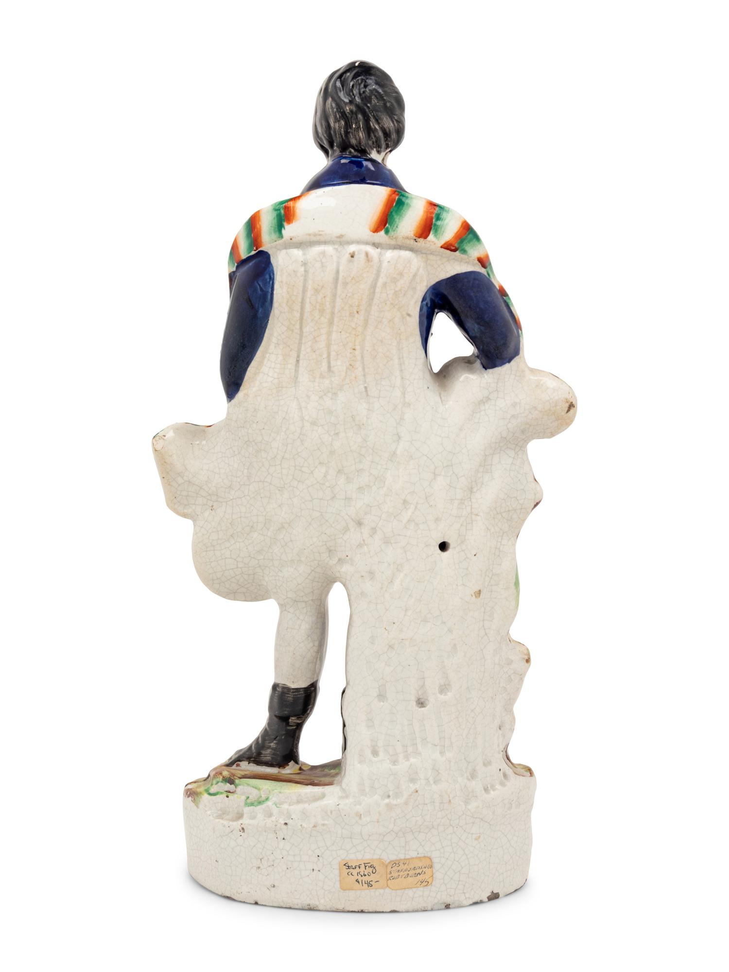 A Staffordshire Ceramic Figure Depicting Robert Burns