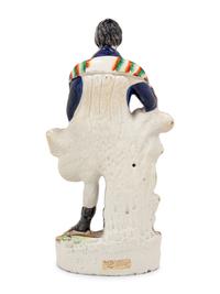A Staffordshire Ceramic Figure Depicting Robert Burns