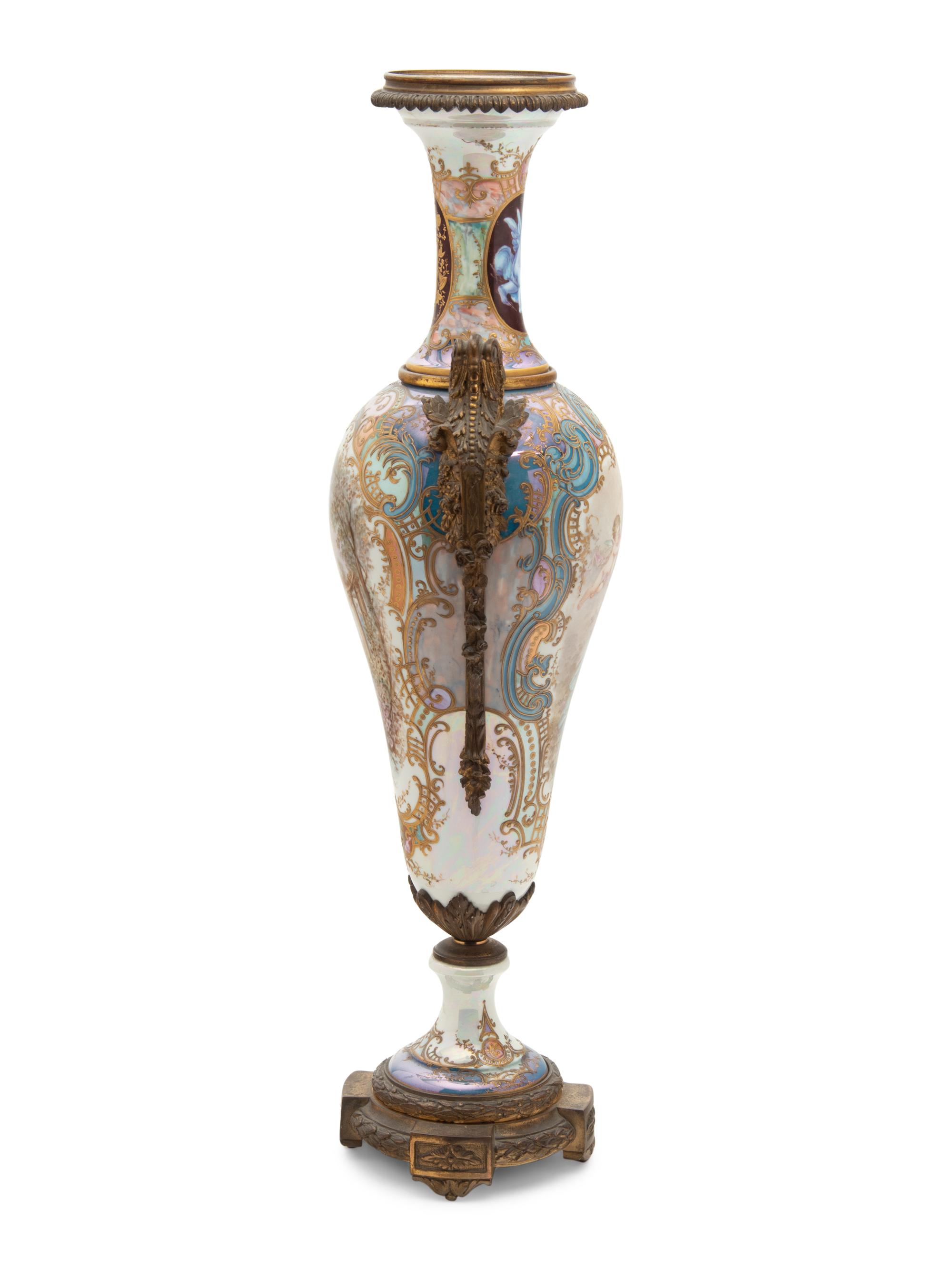 A Sèvres Style Gilt Bronze Mounted Porcelain Urn