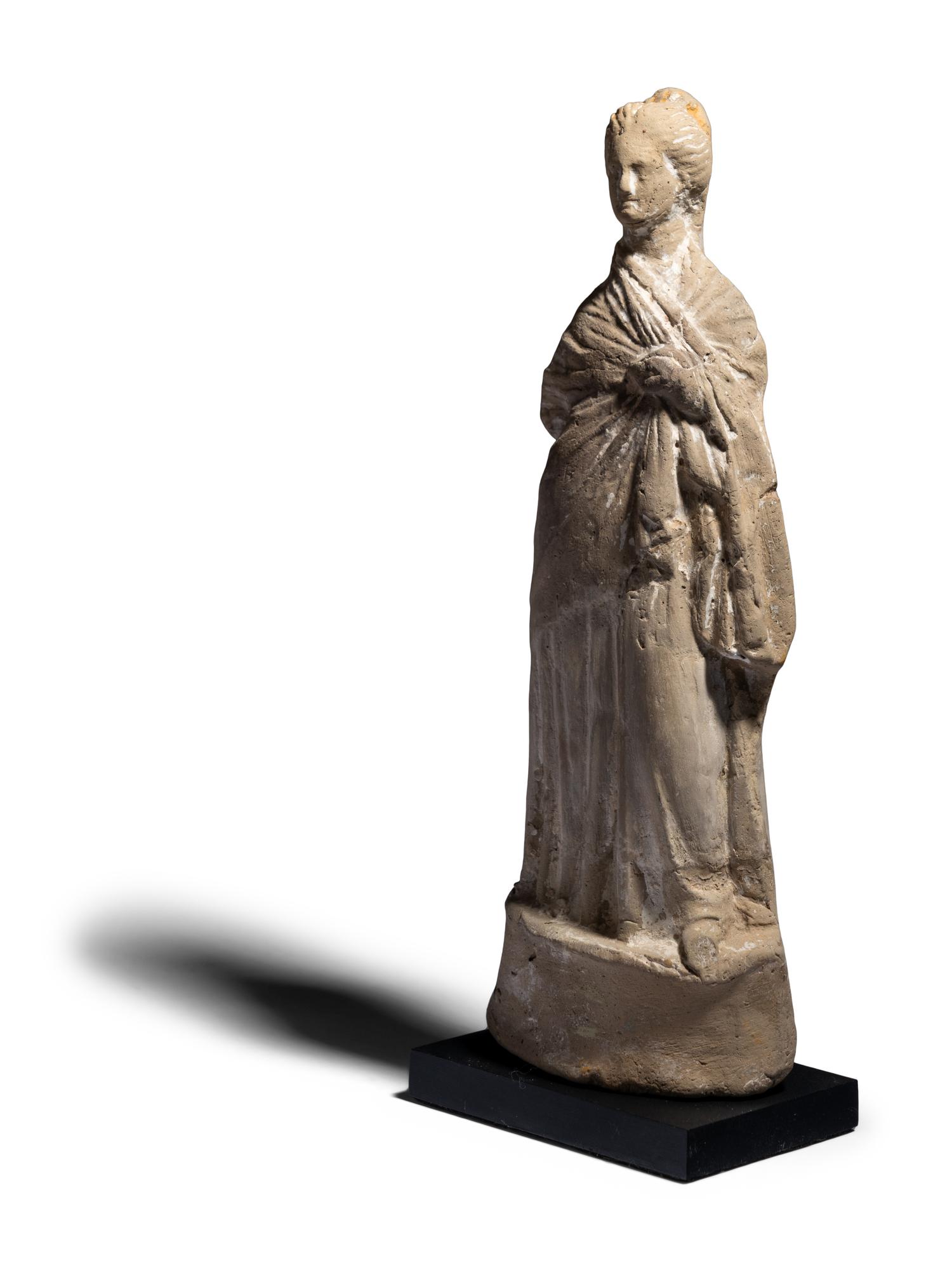 A Greek Terracotta Figure