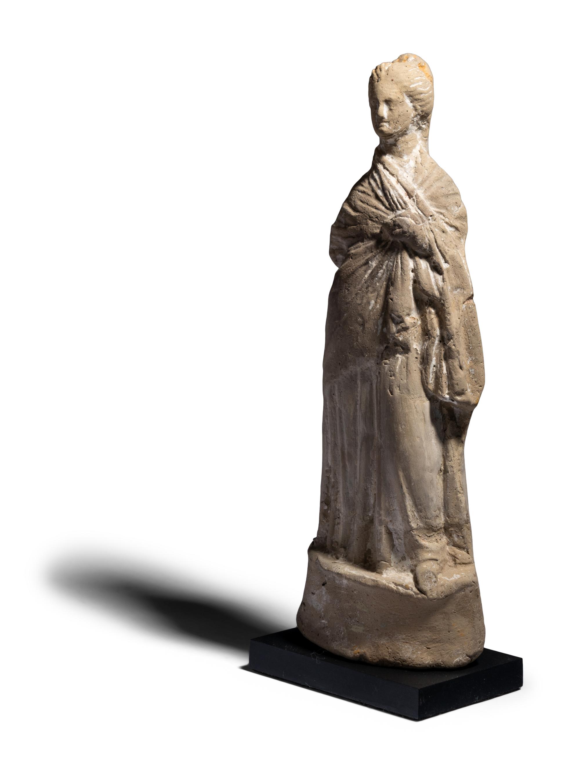 A Greek Terracotta Figure