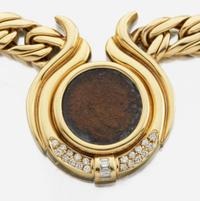 A gold, diamond, and coin necklace