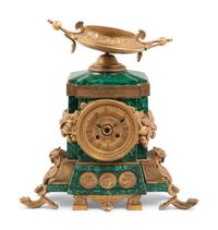 An Empire Style Gilt Bronze and Malachite Veneered Mantel Clock