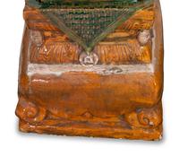 A Pair of Chinese Sançai Glazed Ceramic Guardian Lions on Pedestal Bases