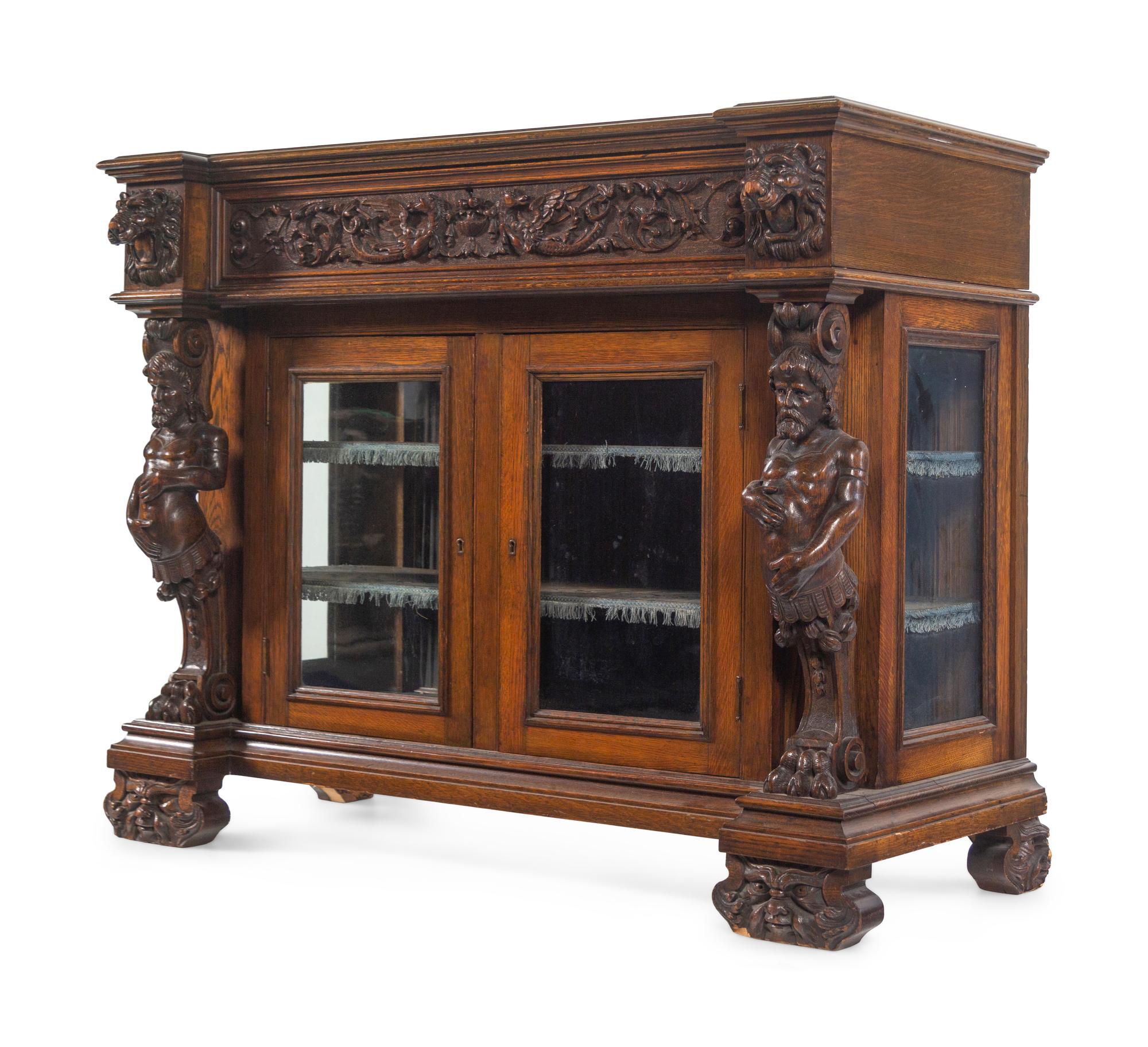 An R.J. Horner Carved Oak Man of the Mountain Serving Cabinet