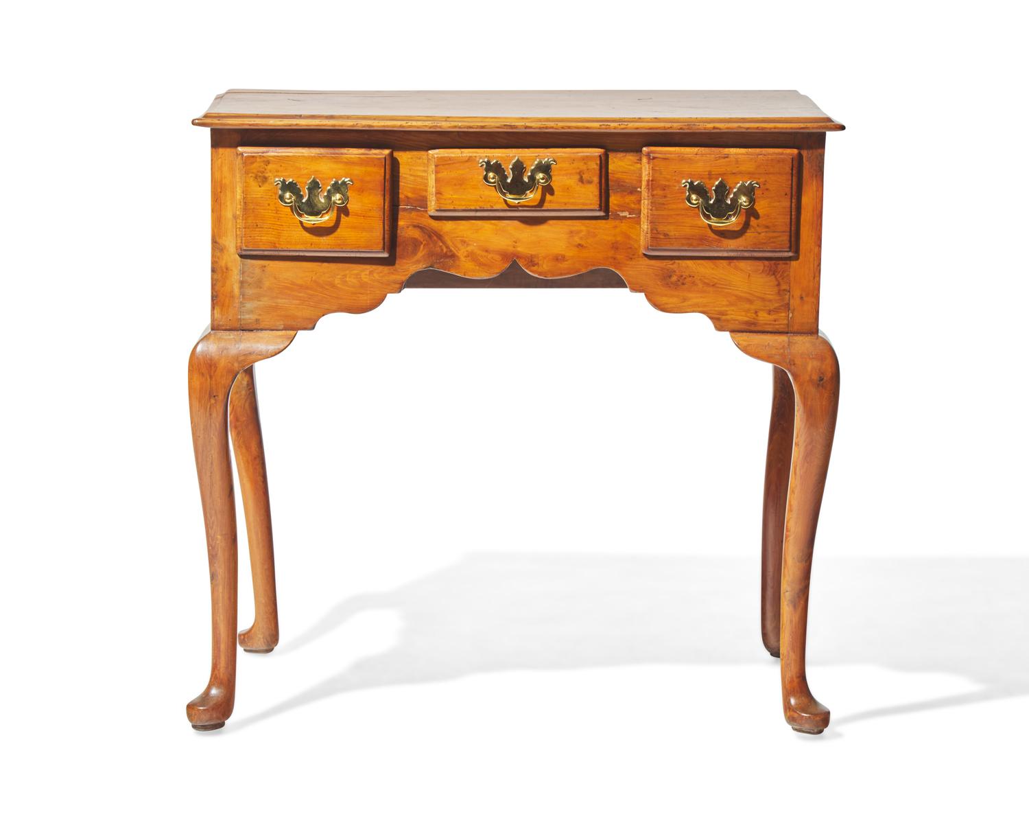 A George II yew dressing table, circa 1750