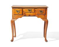 A George II yew dressing table, circa 1750