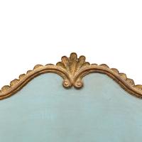 A Continental Parcel-Gilt Headboard