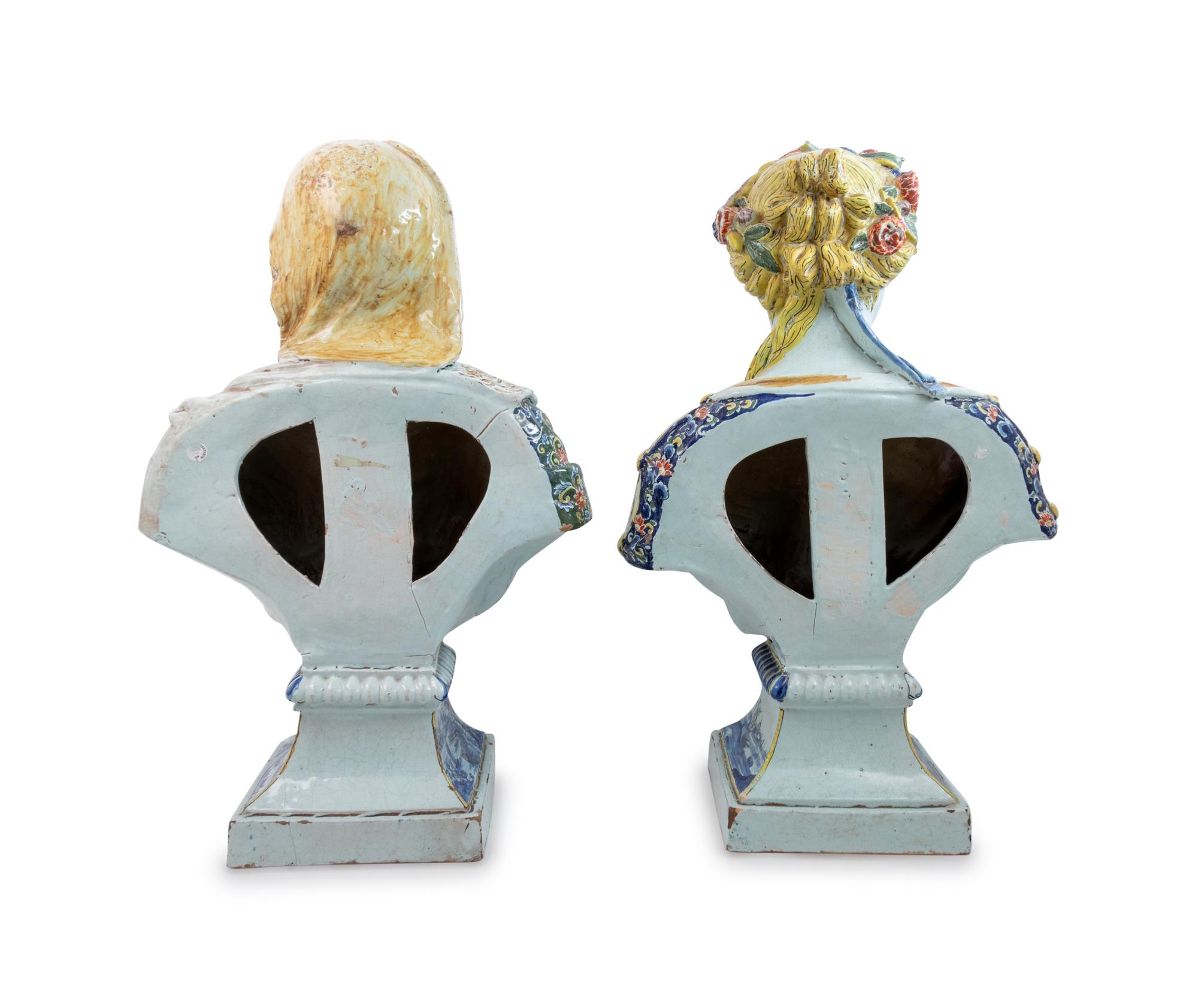 A Pair of Rouen Style Polychrome Glazed Terra Cotta Busts