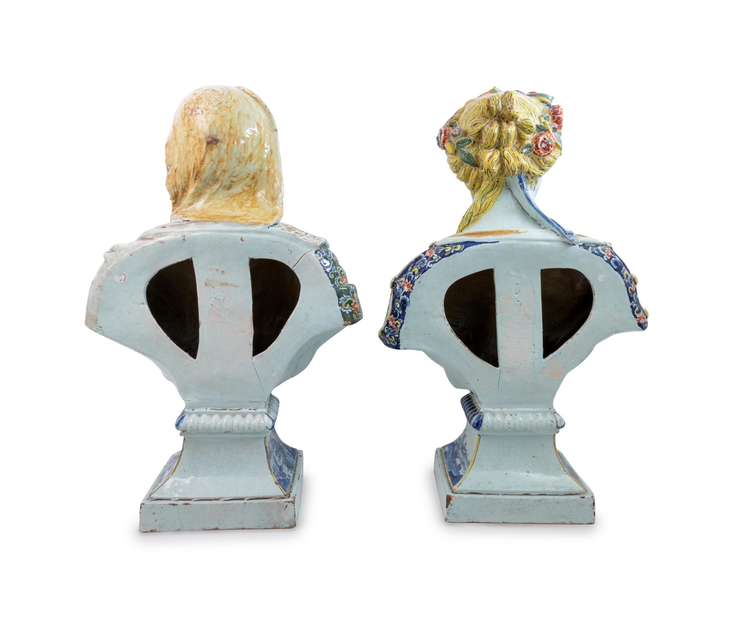 A Pair of Rouen Style Polychrome Glazed Terra Cotta Busts
