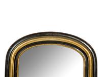 A Victorian Ebonized and Parcel Gilt Mirror