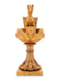 A Continental Gilt Bronze Oil Lamp with a Dragon Handle