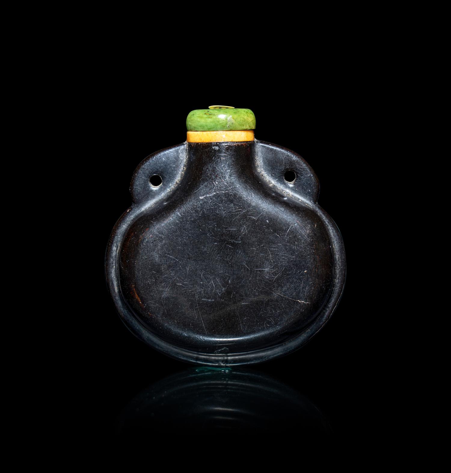 A Chinese Black Lacquered Wood Snuff Bottle