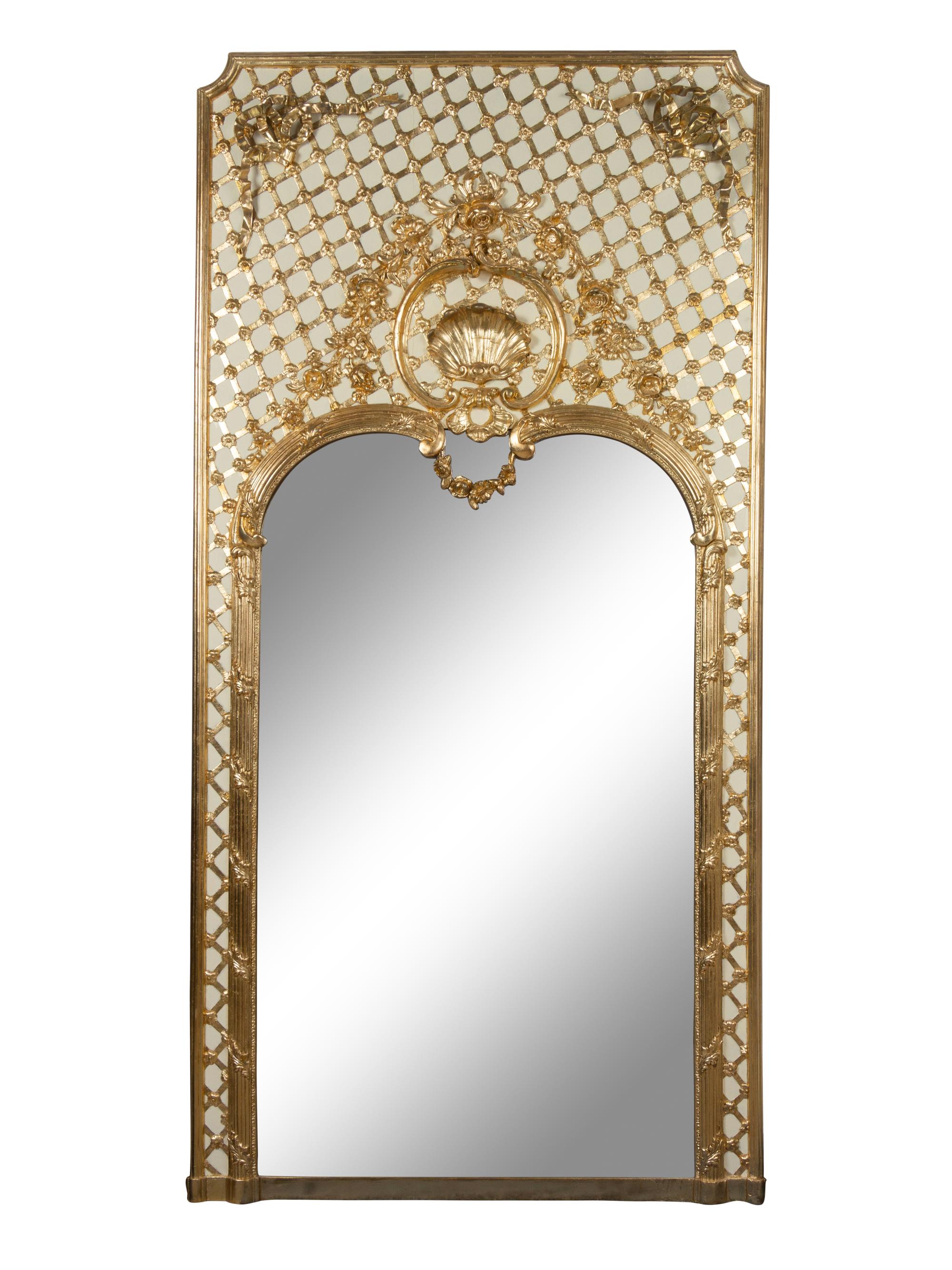 A Pair of French Painted and Parcel Gilt Trumeau Mirrors