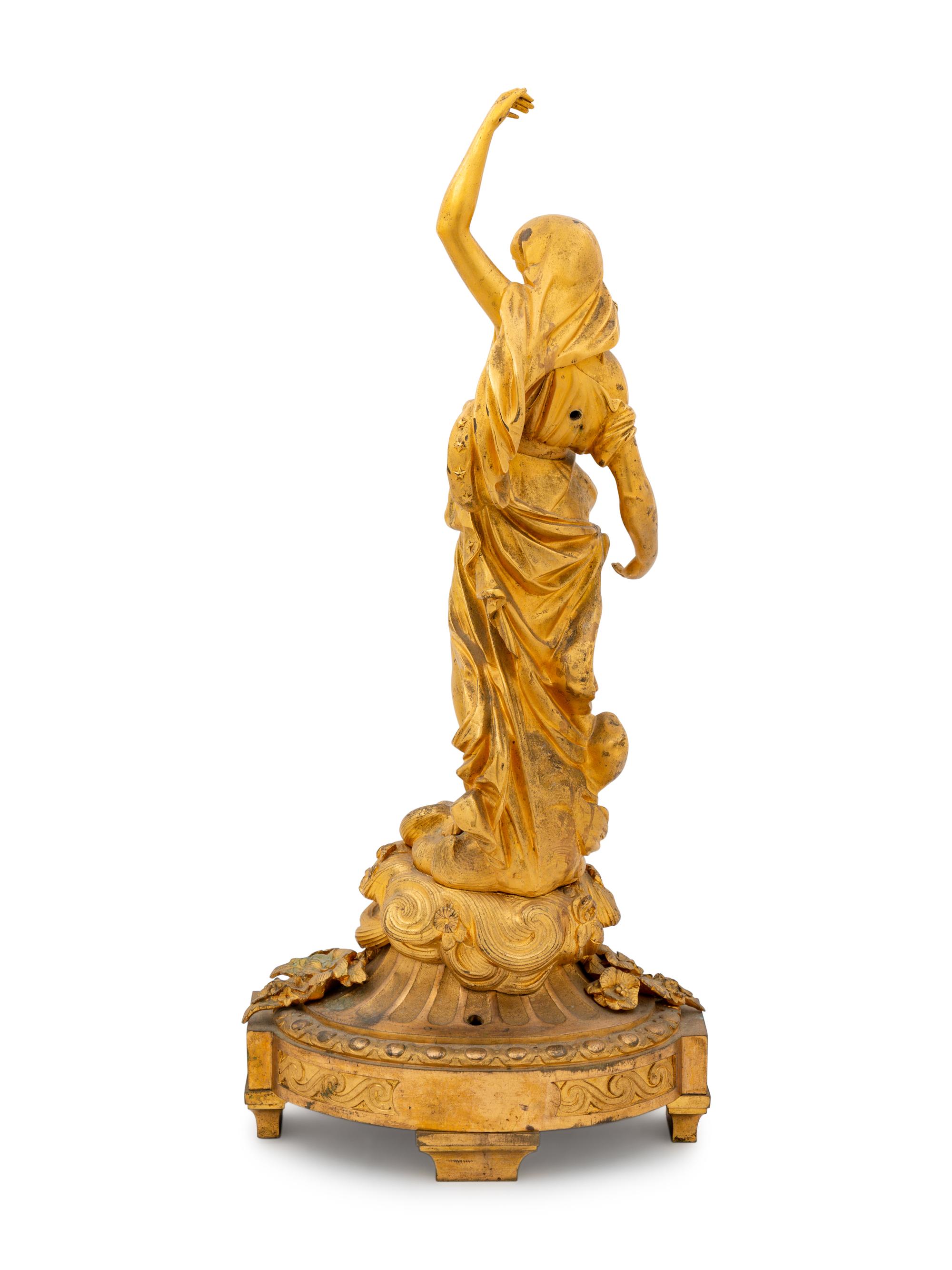 A Neoclassical Gilt Bronze Figural Candelabrum