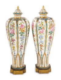 A Pair of Sèvres Style Porcelain Covered Vases