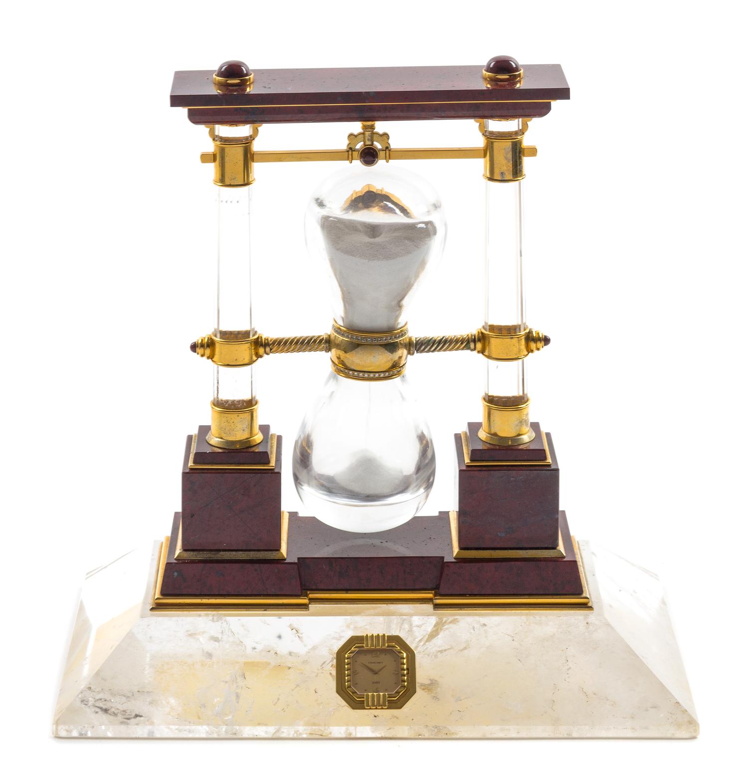 A French Carved Jasper, Rock Crystal, Diamond and Silver-Gilt Desk Clock Height 12 1/4 x width 12 1/4 inches. — Chaumet, Paris