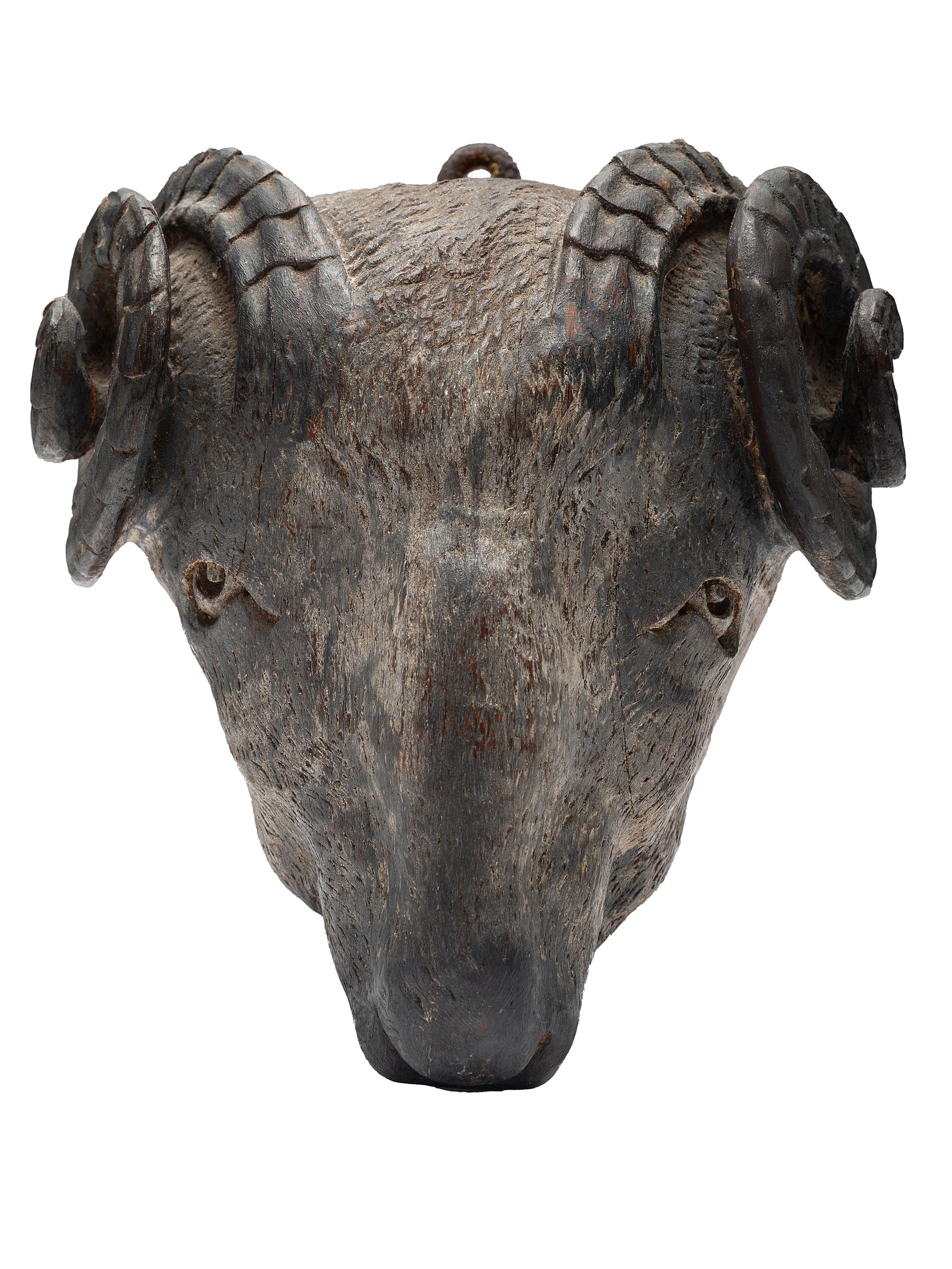 A Carved and Painted Wood Ram Figurehead