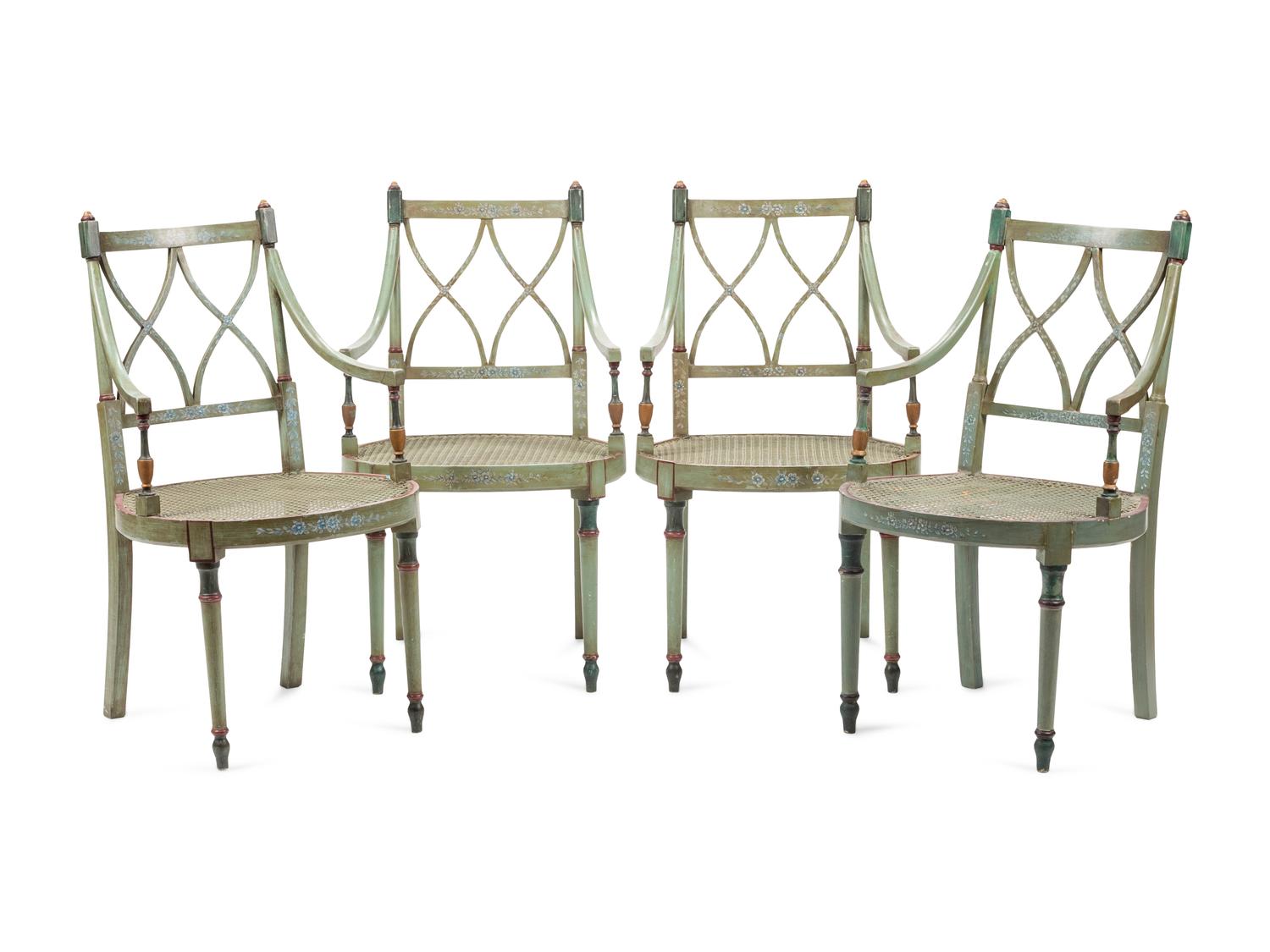 A Set of Four English Painted Armchairs with Cane Seats