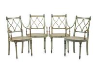 A Set of Four English Painted Armchairs with Cane Seats