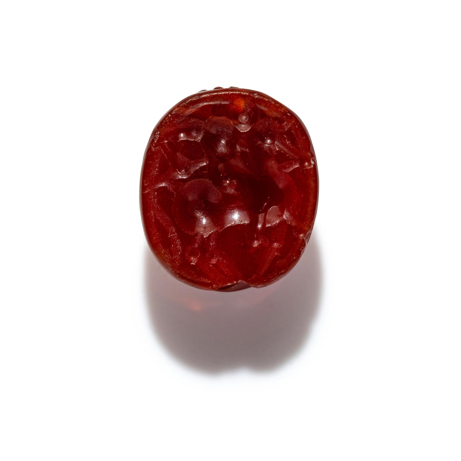 An Etruscan Carnelian Scarab with a Rider on Horseback