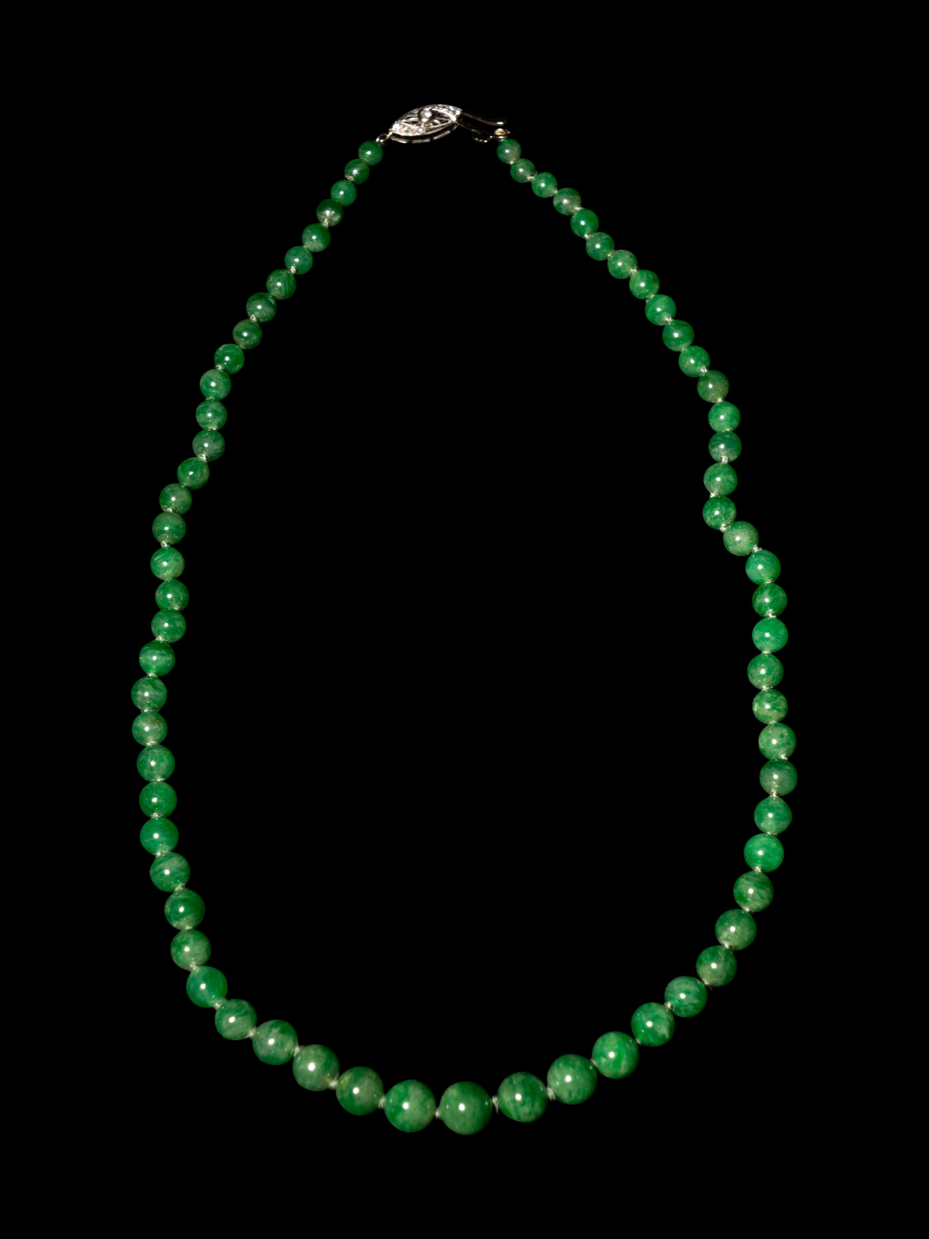 A Jadeite Bead and Diamond Necklace