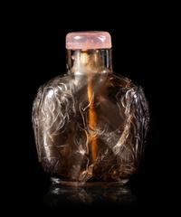 A Carved Smoky Quartz Snuff Bottle