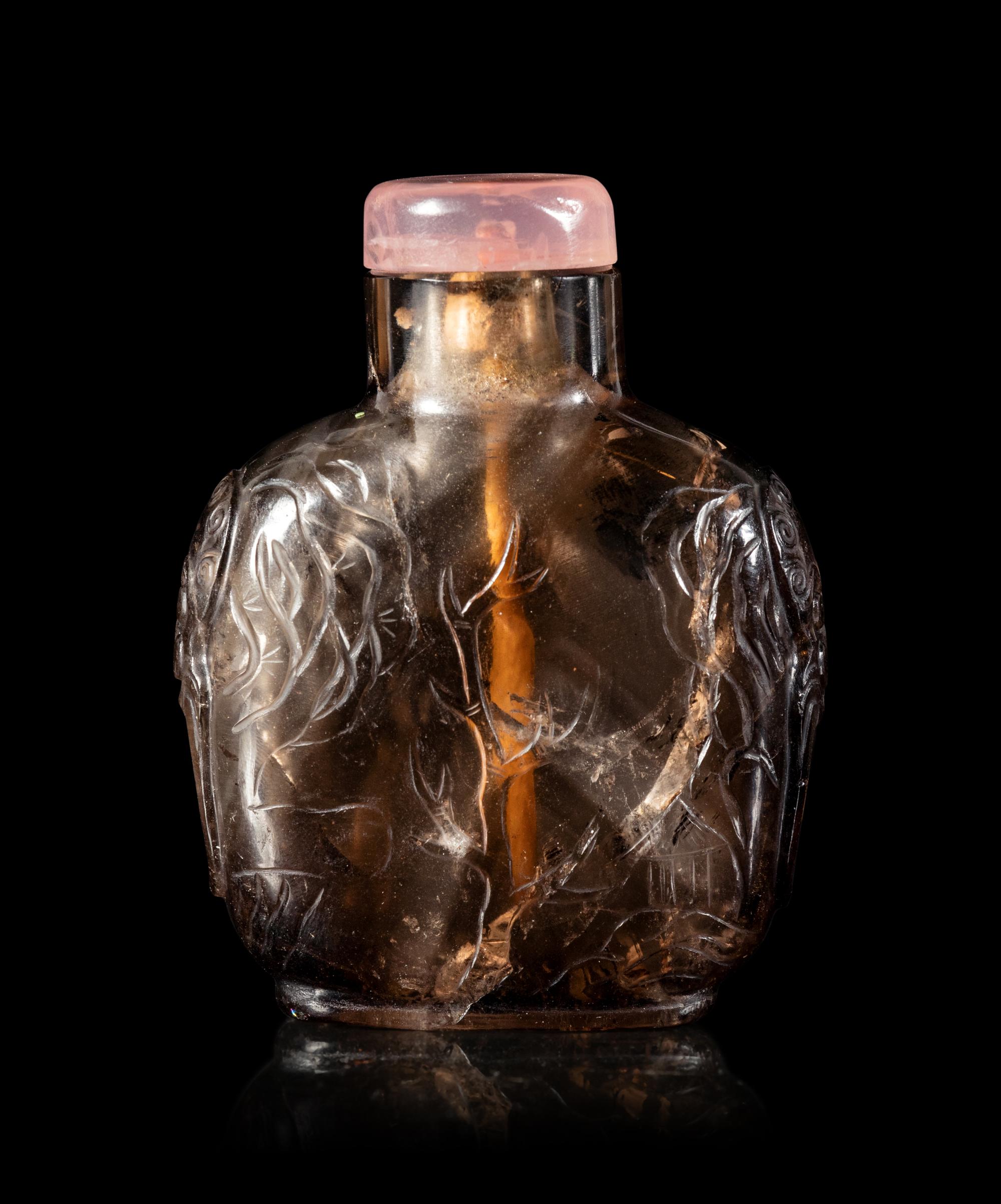 A Carved Smoky Quartz Snuff Bottle