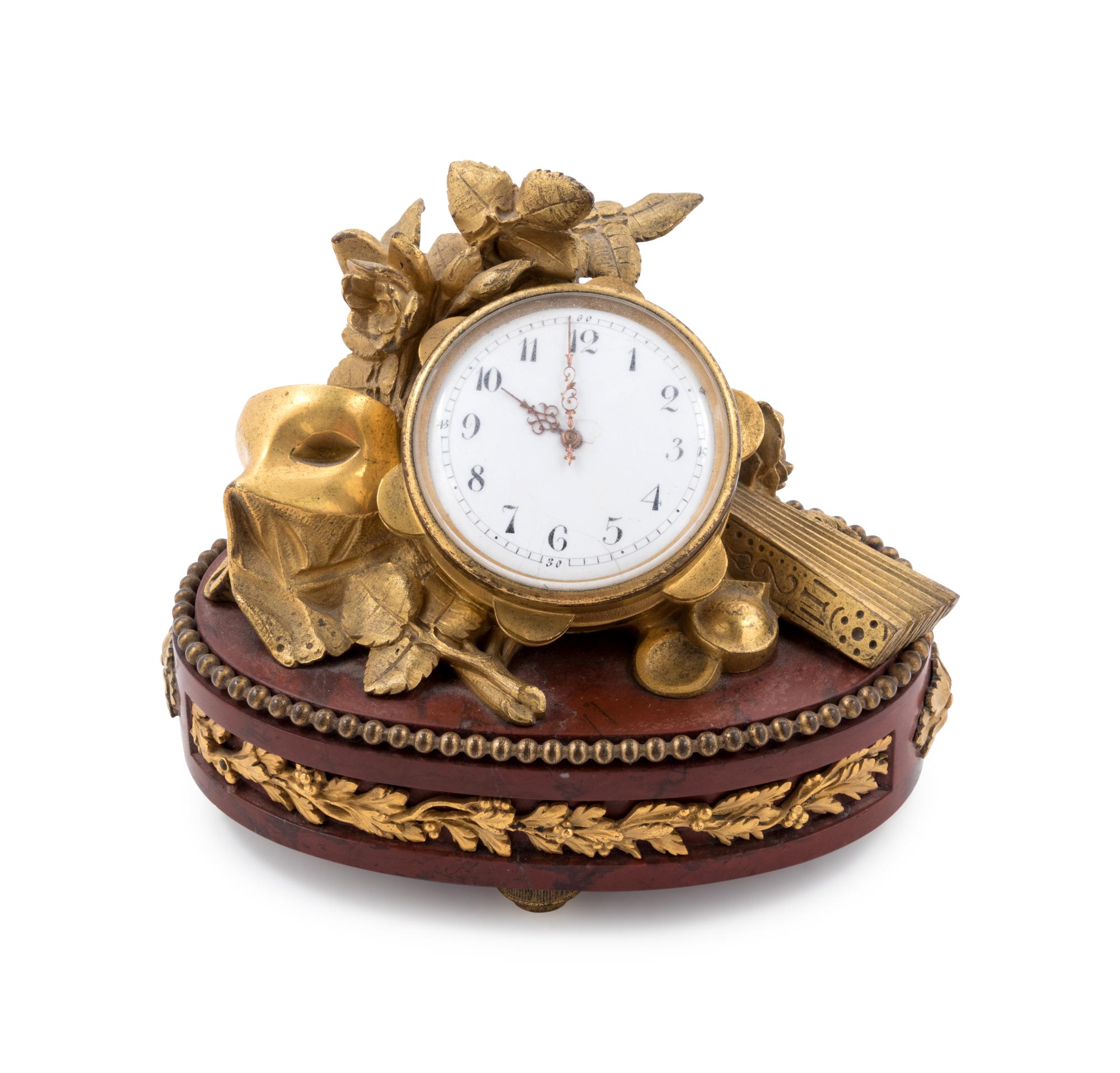 A Louis XV Style Gilt Bronze and Marble Table Clock Attributed to François Linke